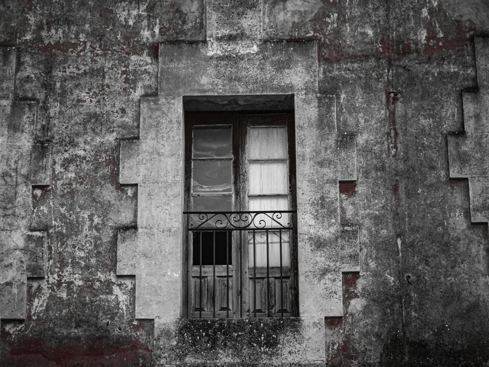 Weathered Parisian balcony window